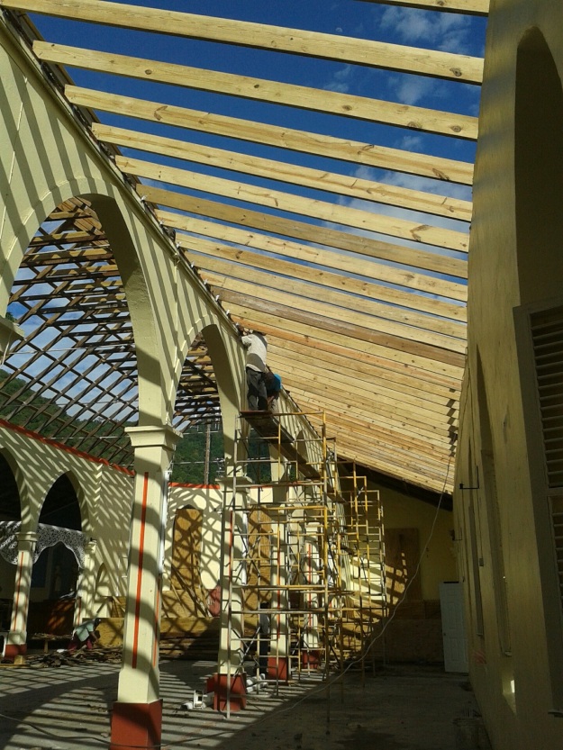 new rafters going up at the church in Pointe Michel on February 7 2014